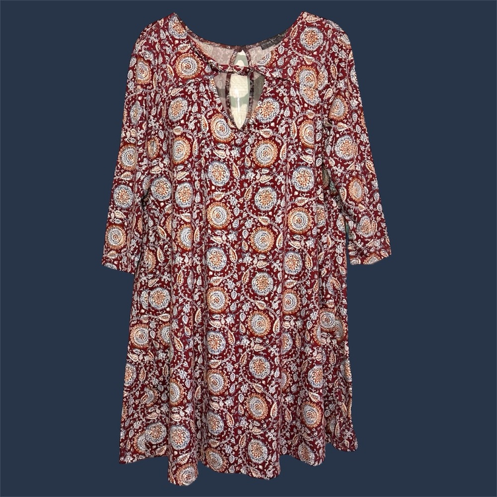 Burgundy and cream paisley dress.